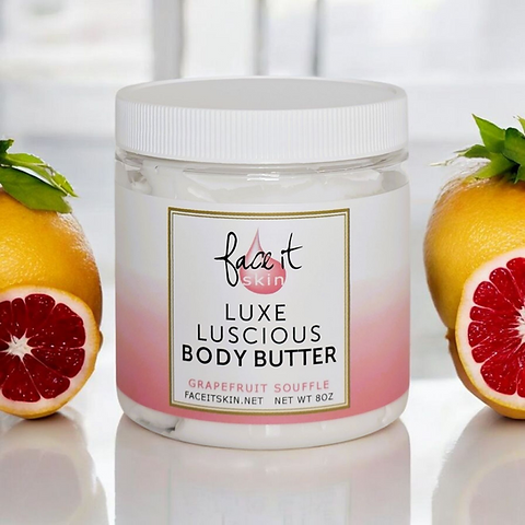Jar of Luxe Luscious Body Butter with grapefruit on a white background