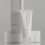 Women applying Green Envee , green Masque to her face.  Potent C Superfood Masque.  Made with vitamin C